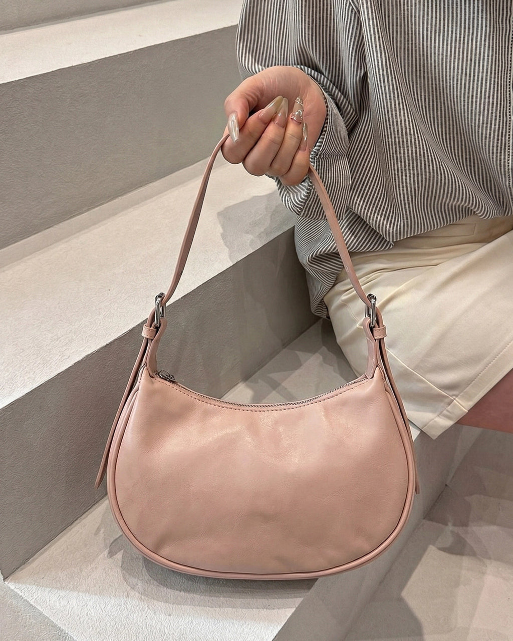 StyleShoot's Minimal Curved Shoulder Bag in Beige