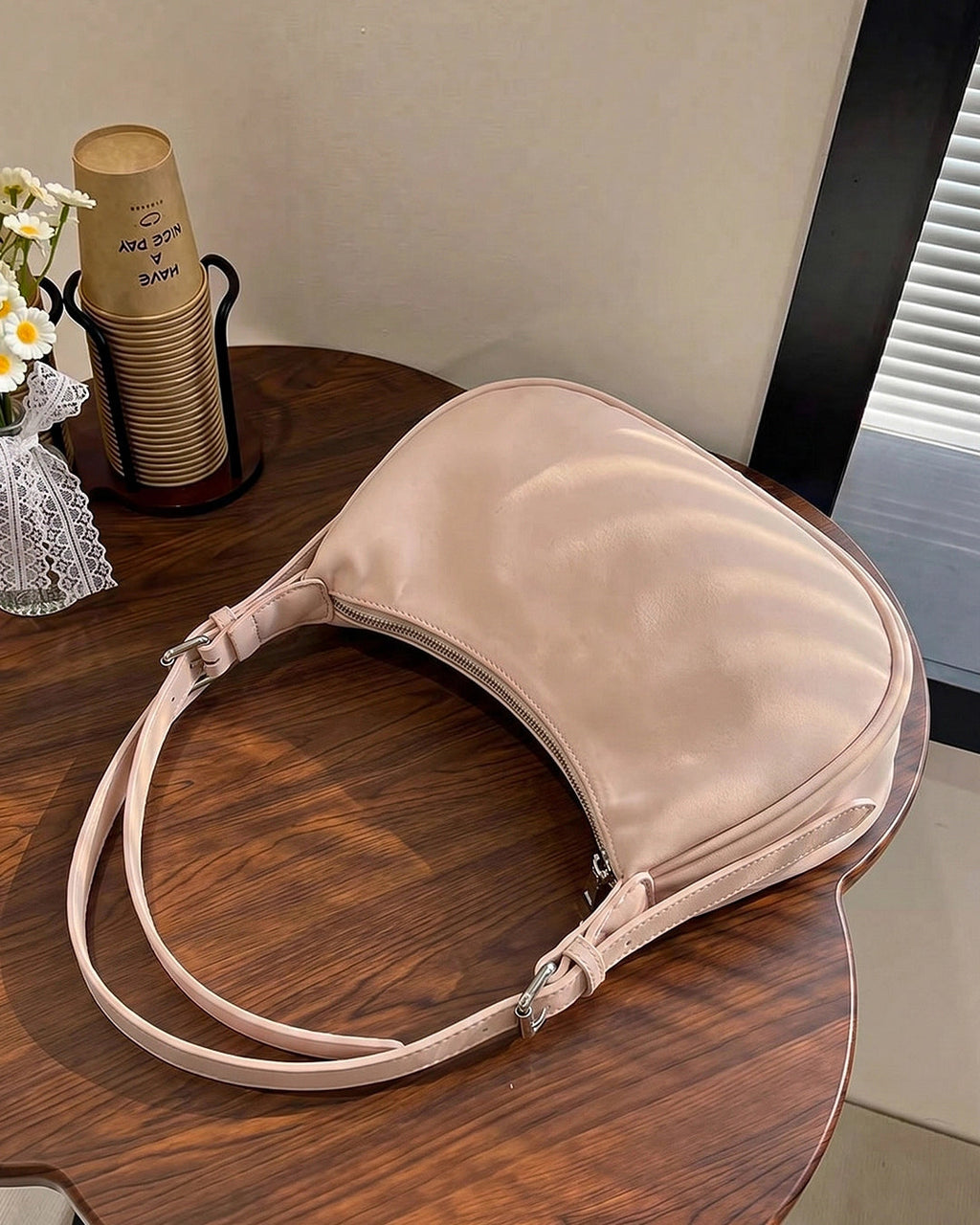 StyleShoot's Minimal Curved Shoulder Bag in Beige