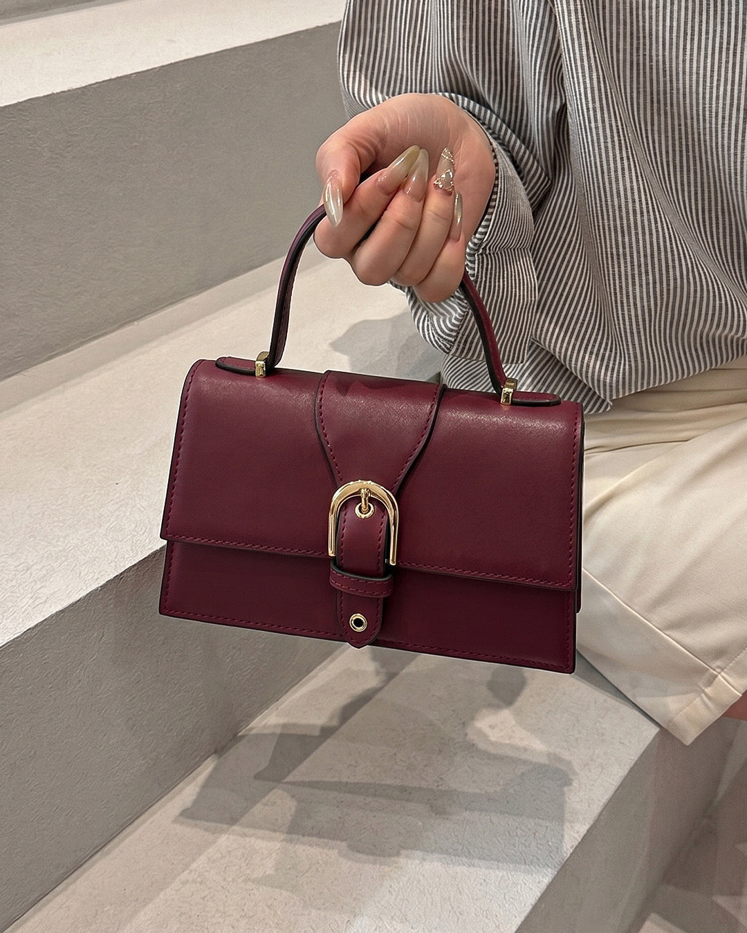 StyleShoot's Chain Strap Top Handle Sling Bag in Cherry Red