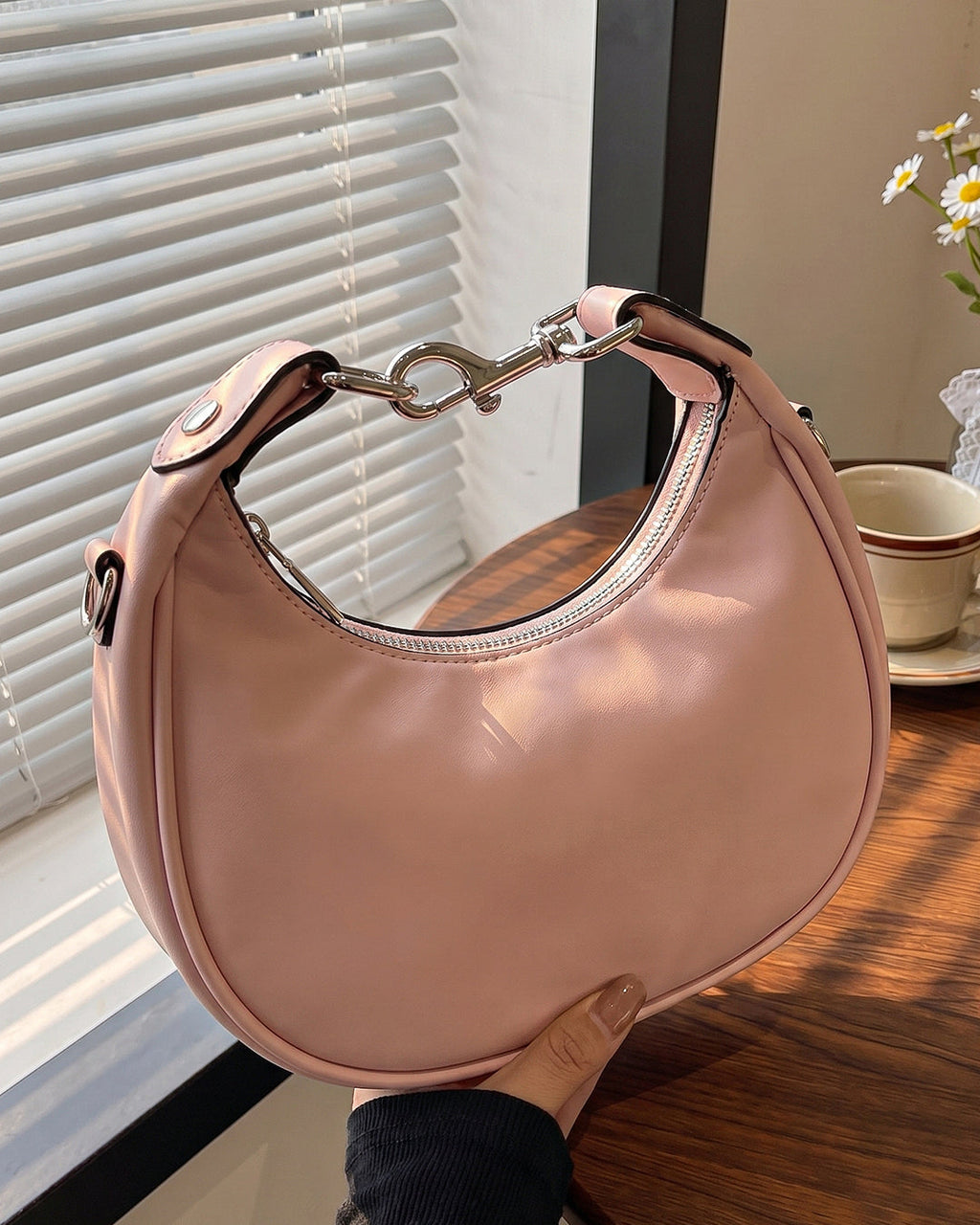 StyleShoot's Stylish Crescent Carry Sling Bag in Baby Pink