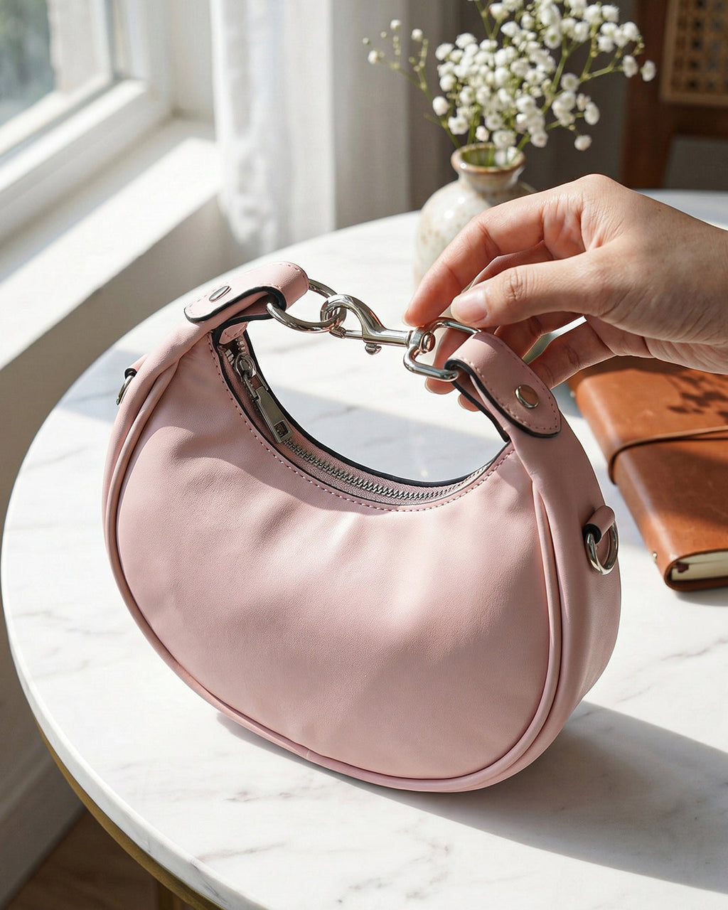 StyleShoot's Stylish Crescent Carry Sling Bag in Baby Pink
