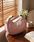 StyleShoot's Stylish Crescent Carry Sling Bag in Baby Pink
