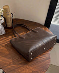 StyleShoot's Sleek Minimal Shoulder Bag in Brown