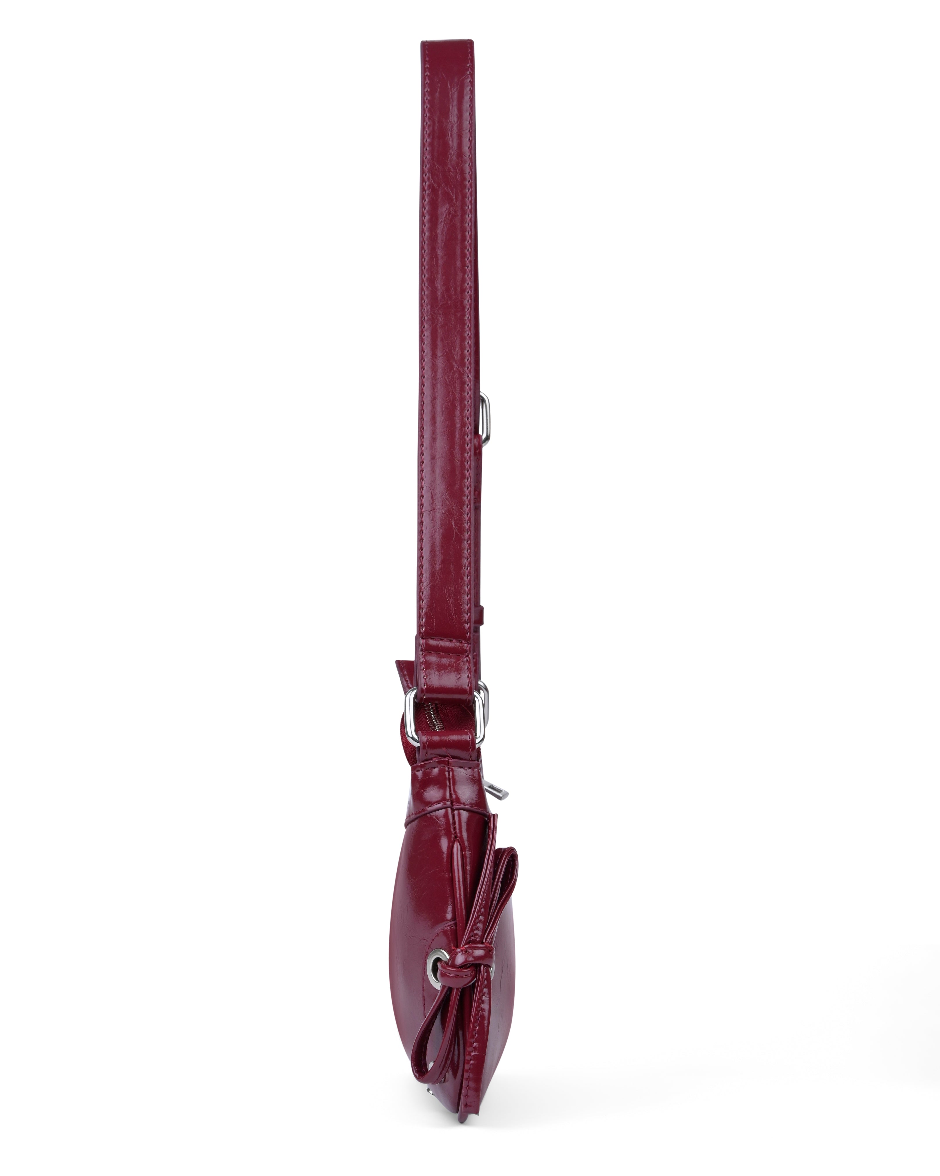 StyleShoot's Glossy Shoulder Bag With Tie Detail in Cherry Red